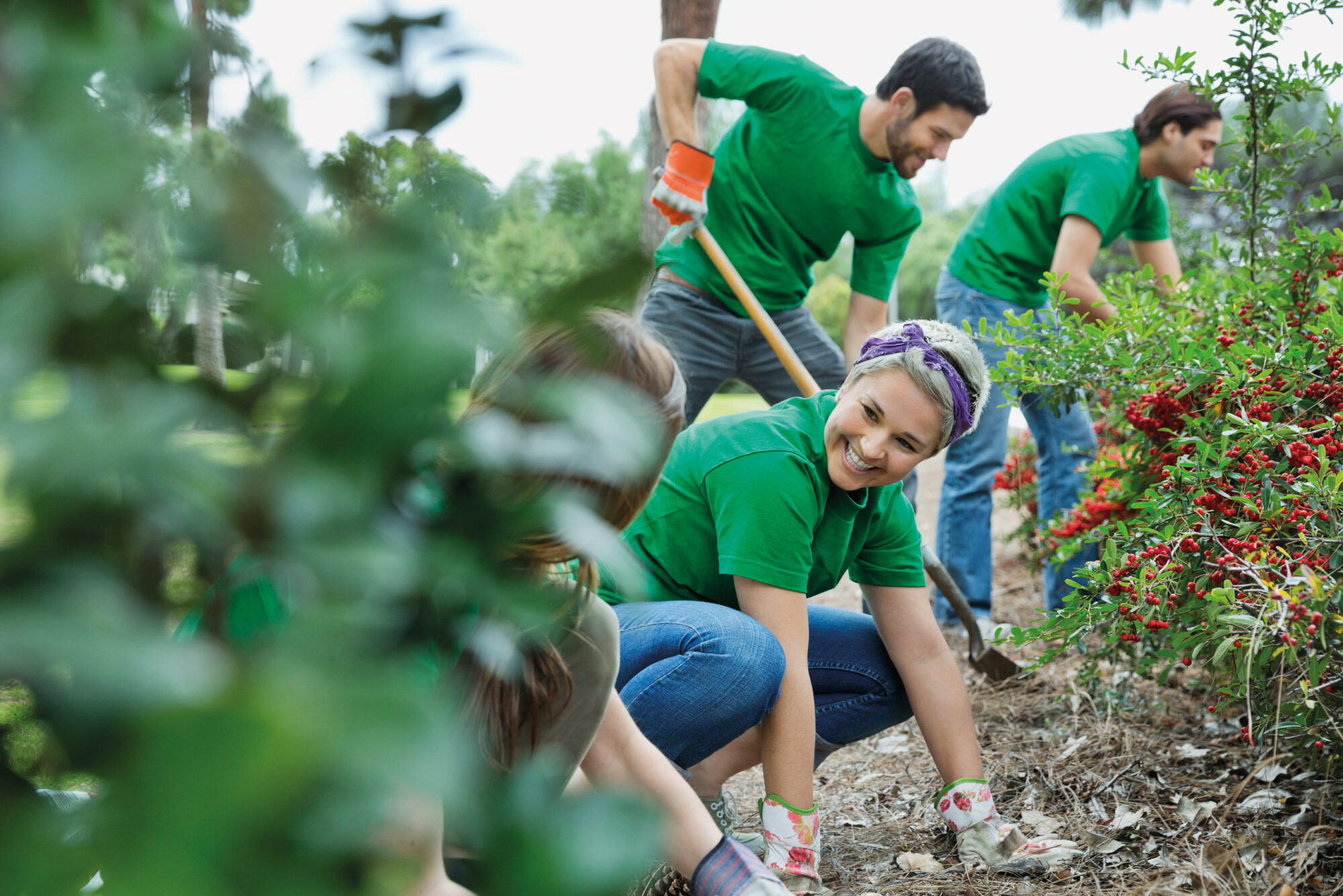 A group of volunteers in a garden